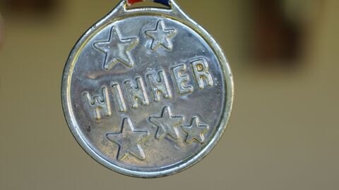 Medaille mit Gewinner-Logo