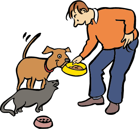 Ein Mann füttert seine Tiere.